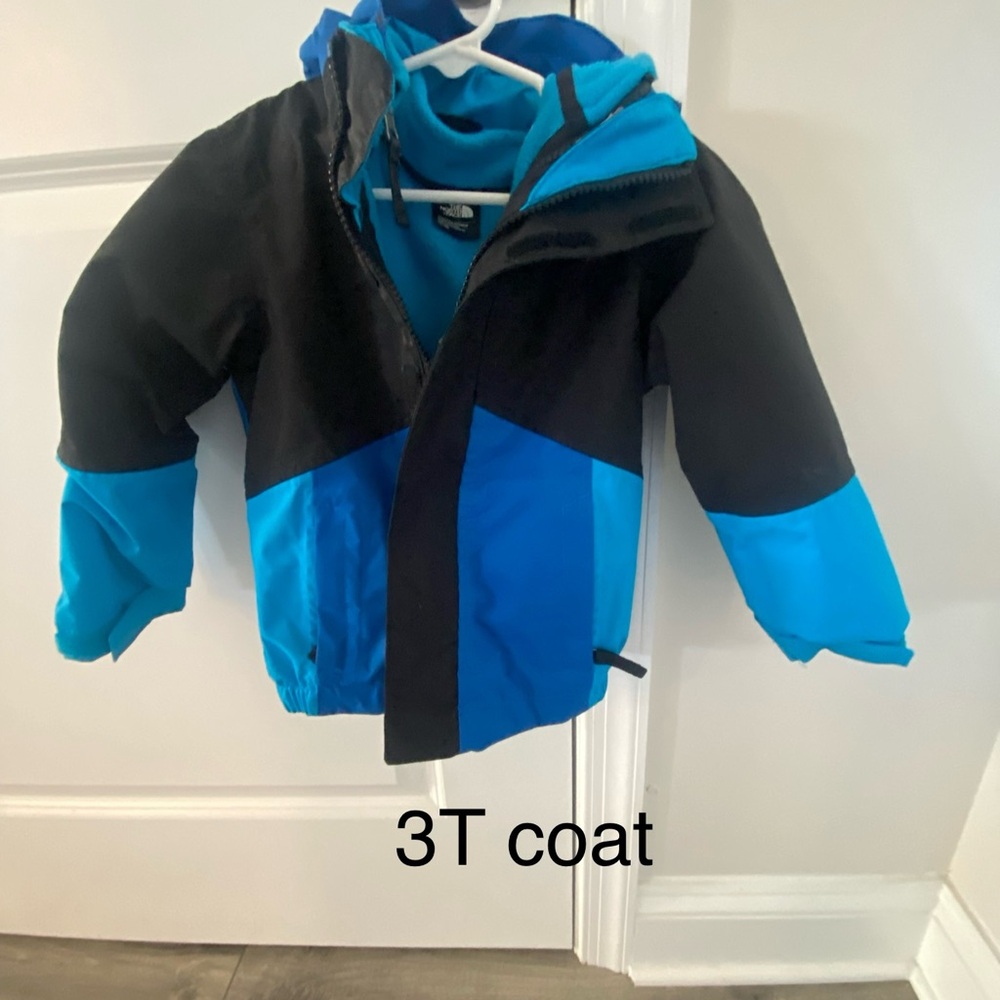 The North Face Kids Black and Blue Puffer Jacket